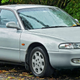 Illustration for article titled Ridiculous Rebadges: Mazda and Ford get into the Aussie Car Fray